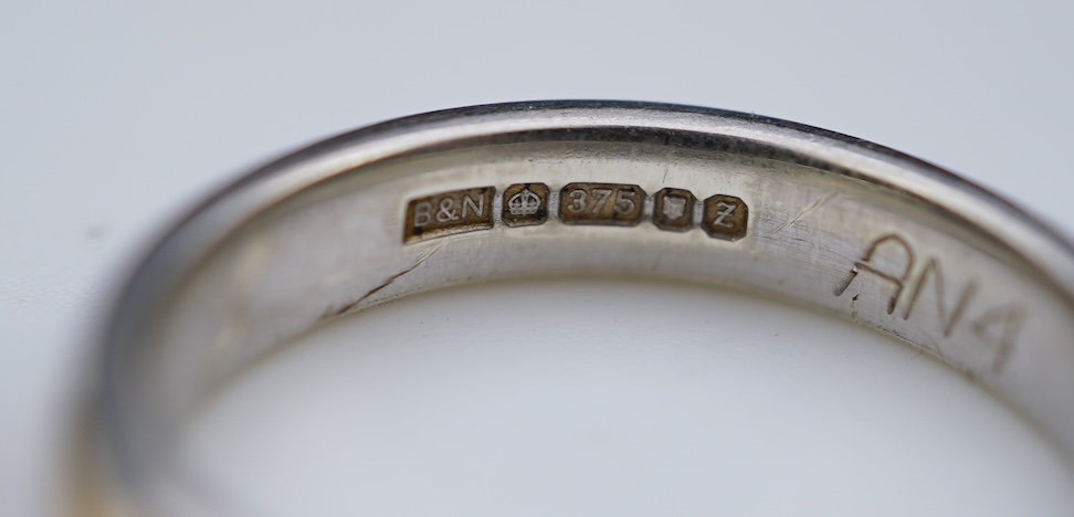 A diamond ring and two gold wedding rings